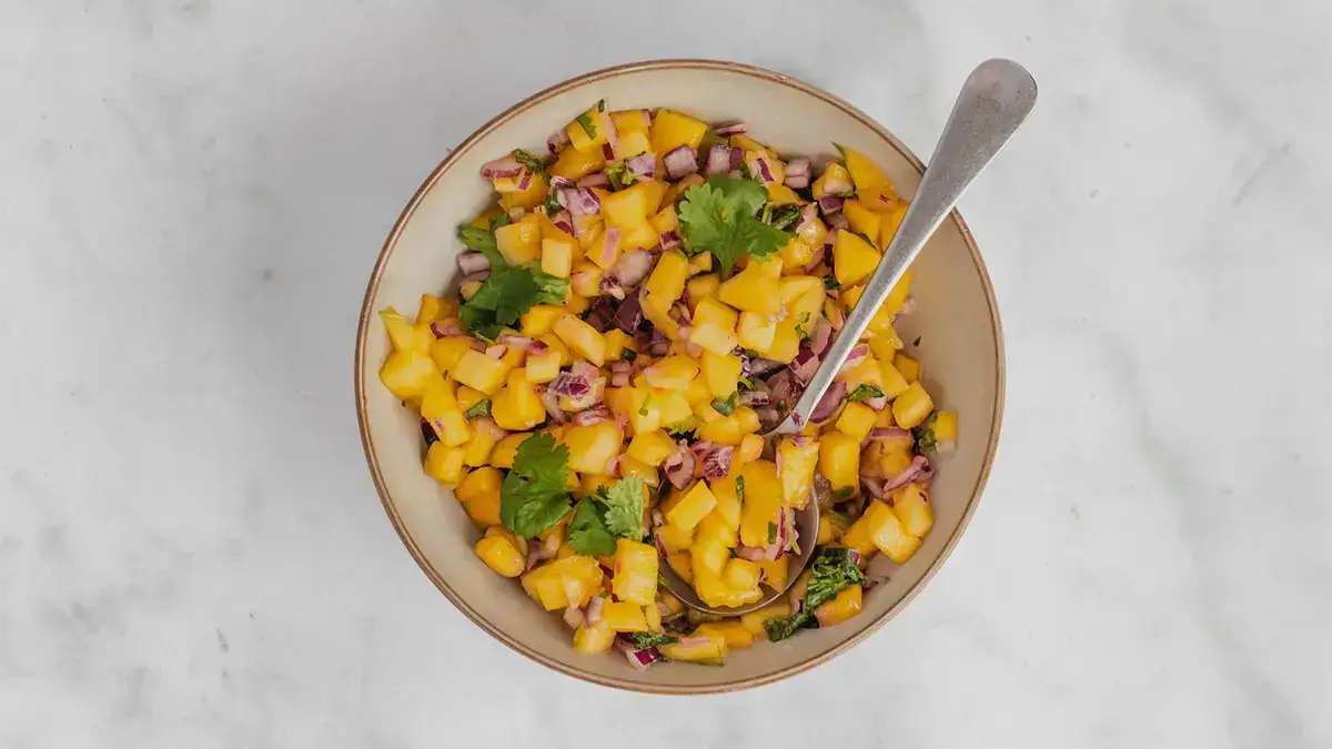 Mango salsa: lekker bij vis en nachos!